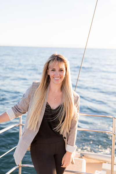 photographer standing on boat off the coast of santa barbara