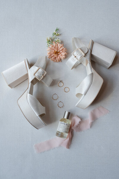 bridal shoes look perfect with orange wedding flowers