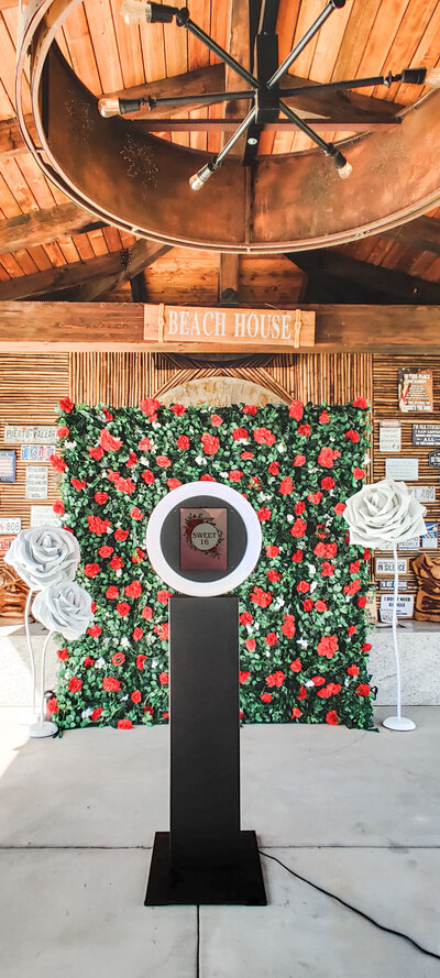 Modern silver balloon installation with geometric diamond-pattern backdrop, styled for glam Arizona parties and corporate events.