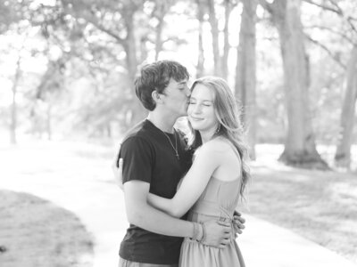 an engaged couple in a park