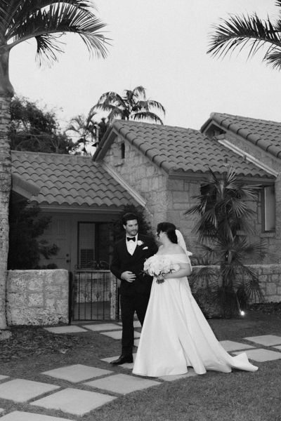 Documentary destination wedding photograph of romantic couple heading to reception | Sush Digital Media