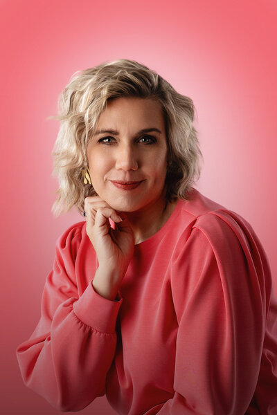 Photographer Michelle Gritters In A Pink Blouse