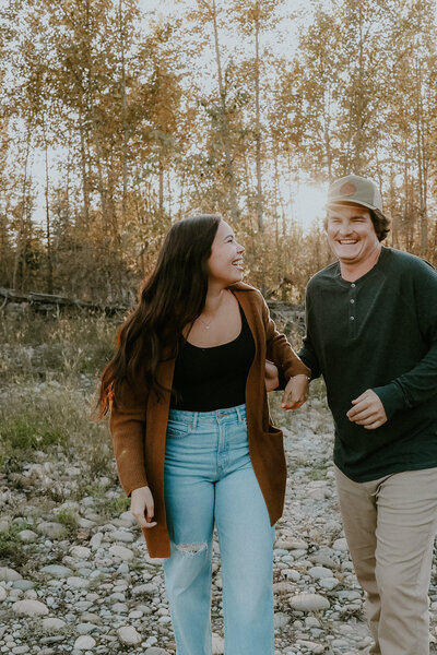 A SUPER FUN AND PLAYFUL COUPLES SESSION DOWN BY THE CREEK IN CENTRAL ALBERTA.