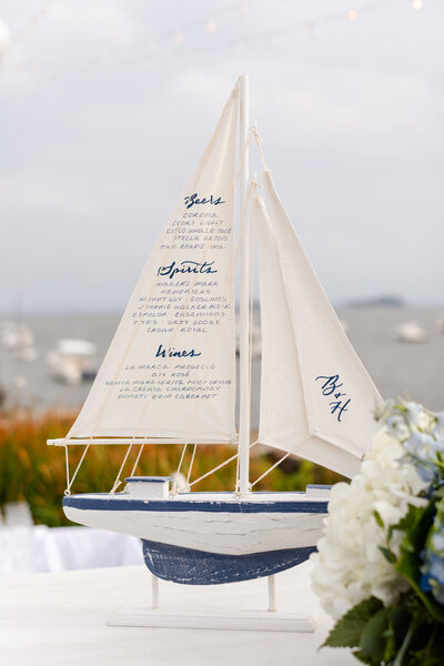 Handwritten bar menu on sailboat for  Belle  Haven Club wedding