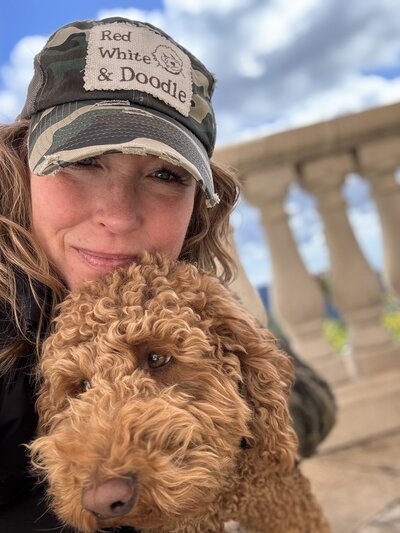 Black Woman with Mini Goldendoodle