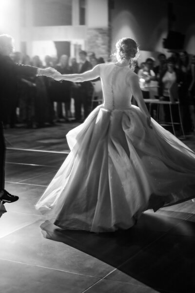 father leads daughter on dance floor at Alpine Ski Club wedding