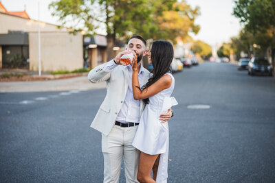 Guests laughing and enjoying the celebration during an Adelaide wedding, captured by JakeyVass Media