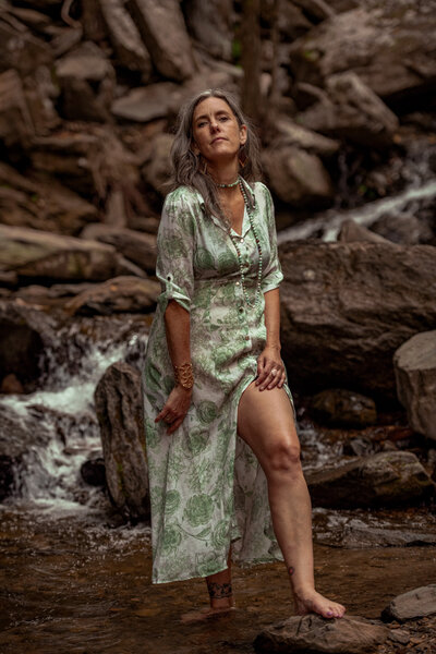 Woman sitting on rocks