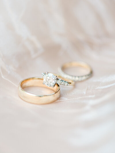 Bride and Groom diamond engagement and wedding rings