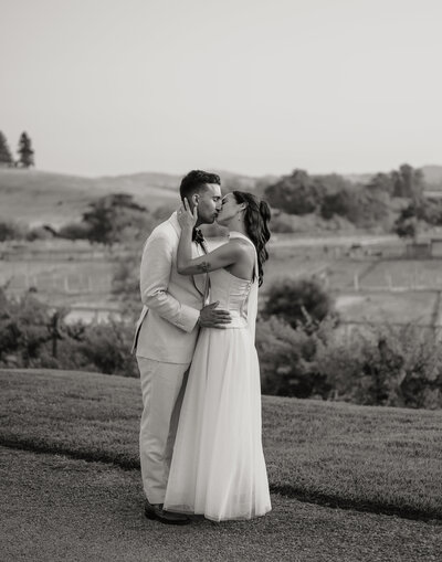 bride standing next to gas