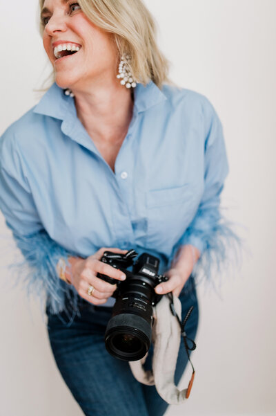 Newborn Photographer Natasha Sewell with her Nikon Camera