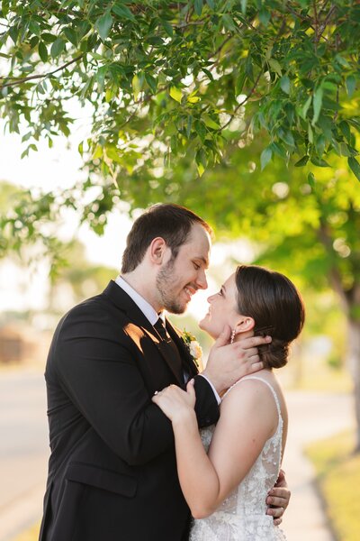 Bride and Groom at sunset sharing a kiss in Fargo, ND