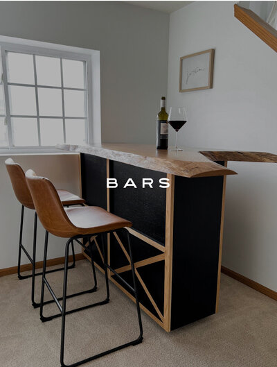farmhouse style white oak and black slab bar