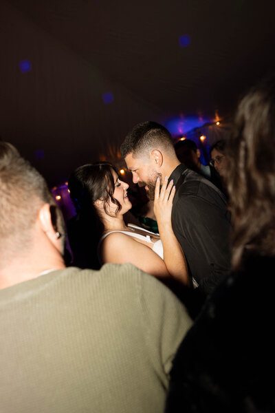 Caitlin and David embracing during their last dance on their wedding night