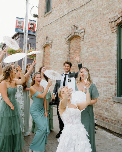 Bridesmaids and wedding photographer