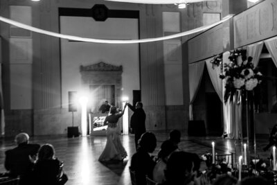 bride and groom standing with bridal party