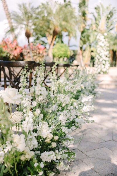 Wedding ceremony aisle florals