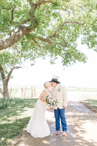 Couple at their ranch stlye wedding in Raymond, South Dakota