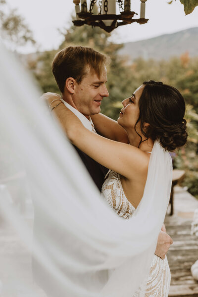 Bride and Groom Holding Eachother