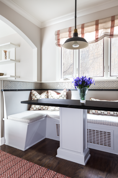 Kitchen table nook with white and black design