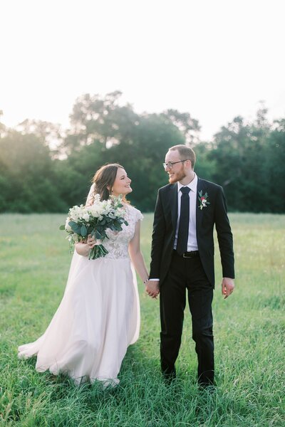 Bride and groom walk up memorial steps at their DC wedding