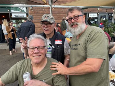 A group of warriors at a fundraising event representing the community and friendships formed at the Warriors Support Group. 