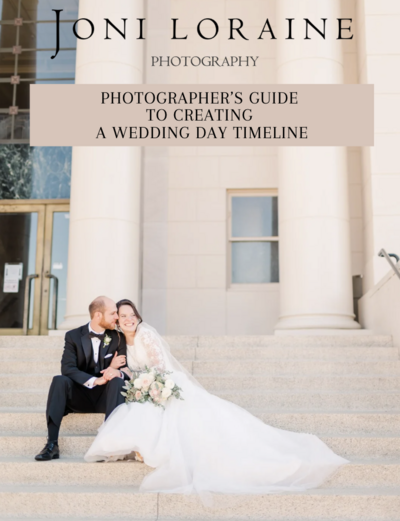 bride and groom sitting on steps of Albany courthouse