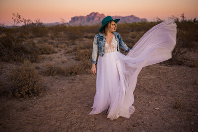 sparkly wedding dress with jean jacket and cowboy hat