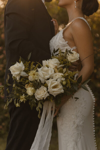 bridea and groom kiss at wedding in arizona