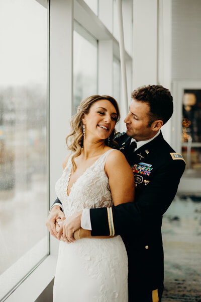 couple posing for wedding photo in winter