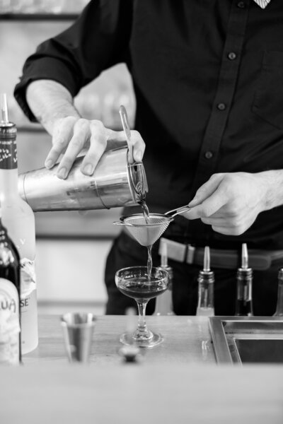 Craft cocktails being poured