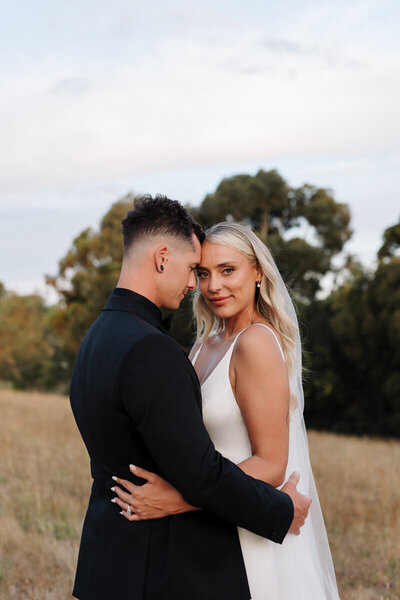 Bride and Groom having an intimate moment.