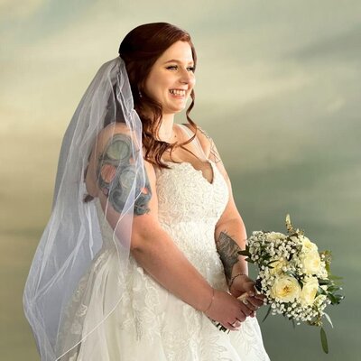 Brunette bride with romantic half-up curls and veil, styled by Your Girl Friday LV for her Las Vegas wedding.