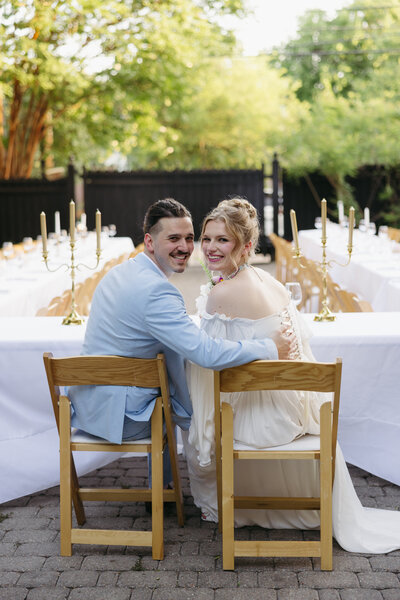 editorial photograph of a bride and groom and their getaway car captured by Southern California film and digital documentary wedding photographer