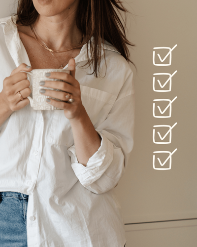 iPod mockup of a woman in a white shirt holding a mug with check boxes drawn