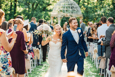 The Hamilton Manor | Bride and groom walking down the aisle just married | Hamilton Township, New Jersey