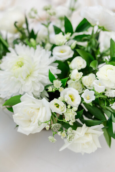 white and green flowers on a table