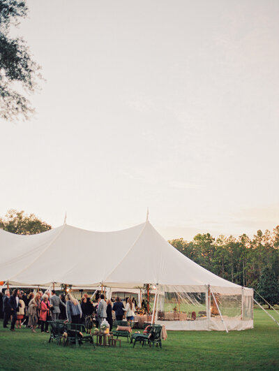 Tented wedding reception in a field