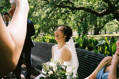A bride laughs during her wedding in New Orleans