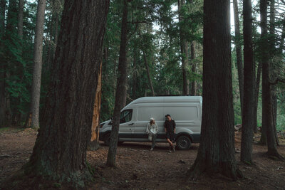 couple in front of van