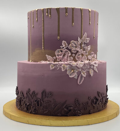 top of a custom wedding cake with pink flowers