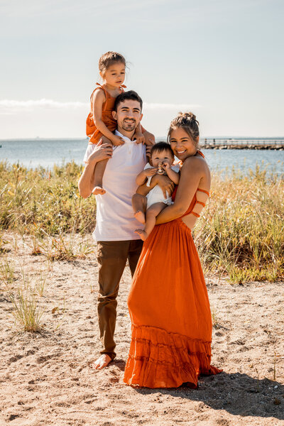 lovely family on beach at their connecticut photoshoot