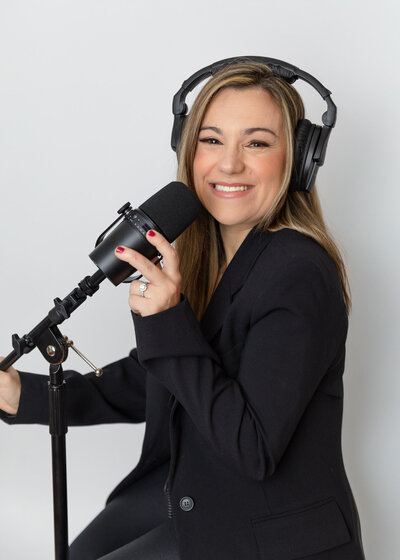 CEO Jackie Zuk taping a podcast