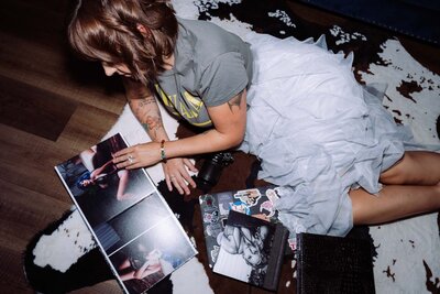 a woman holding photos
