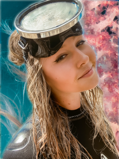 Blonde Blue eyed girl Tiffany Simonovski wearing Waterproof wetsuit and scuba diving gear