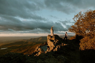 Shenandoah elopement at sunset showing a couple on top of a mountain after getting married. Photography by Rock & Wander Photo Co.