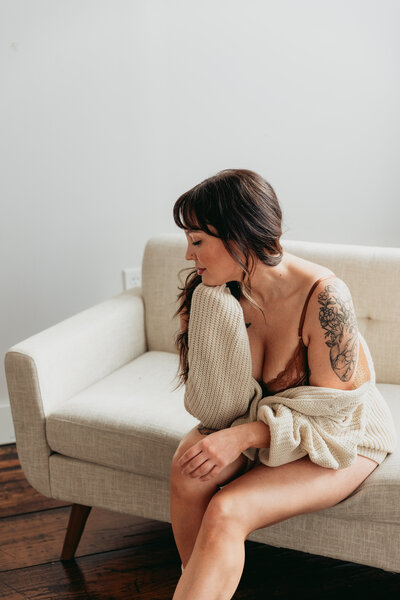 woman sitting on couch 