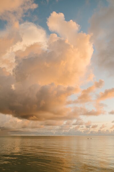 clouds over the ocean at dusk