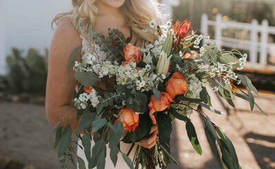 Lake Tahoe Elopement Photographer captures boho bridal bouquet