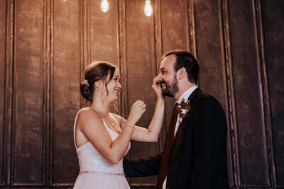 Destination Wedding Photographers capture bride feeding groom cake